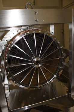<p>eROSITA mirror module (from front), being prepared for quality tests with X-rays in the PANTER test facility. The 54 individual mirrors are placed one inside the other like a Russian Matryoshka doll and have to be aligned with high precision.</p>