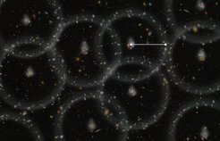<p>An artist's concept of the new measurement of the size of the Universe.</p>
<p>The gray spheres show the pattern of the "baryon acoustic oscillations" from the early Universe. Galaxies today have a slight tendency to align on the spheres -- the alignment is greatly exaggerated in this illustration. By comparing the size of the spheres (white line) to the predicted value, astronomers can determine to 1% accuracy how far away the galaxies are.</p>