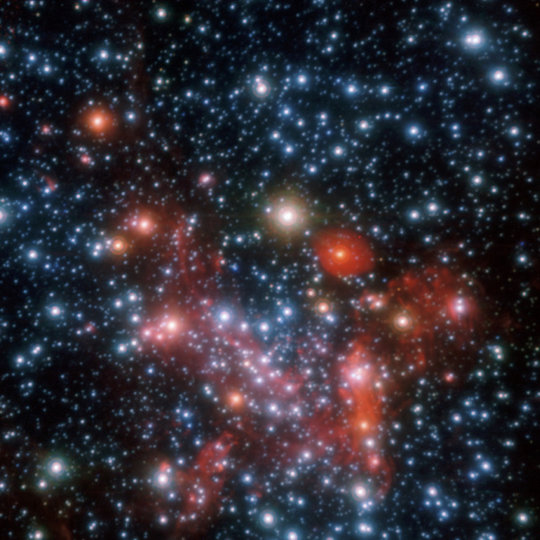 <em>Combined H- K- and L-band adaptive optics image of the Galactic Center obtained with NACO on the VLT. The image is 30'' across</em>.
