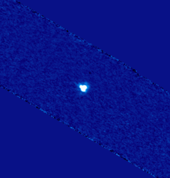 Fig.1: This image of the minor planet 2005 YU55 at a wavelength of 70 micron was reconstructed from more than 3500 individual exposures with the Herschel space observatory. The shape of the image shows the point spread function of the telescope, the asteroid itself is too small to be resolved with Herschel.