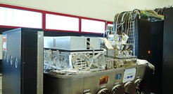 View of the GRAVITY instrument during construction, before closing the cryostat. To the left of the image, the connections for the beam lines from the four VLT telescopes are visible.