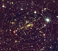 Optical image of the cluster MACS1206, with X-ray contours (N. Clerc, J. Ridl). The optical data were obtained using the WFI instrument on the MPI/ESO 2.2m telescope, while the X-ray data came from XMM-Newton.