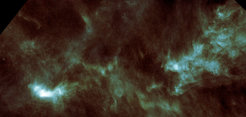 Herschel’s infrared view of part of the Taurus Molecular Cloud, with the bright, cold pre-stellar cloud L1544 at the lower left. The Taurus Molecular Cloud is about 450 light years from Earth and it is one of the nearest large regions of star formation.
