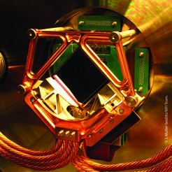 Athena/WFI Detector Module mounted in a vacuum chamber. The copper mounting and cooling interface surrounds the sensor's entrance window. The full-scale DEPFET sensor and the Detector Electronics are cooled separately to different temperatures.