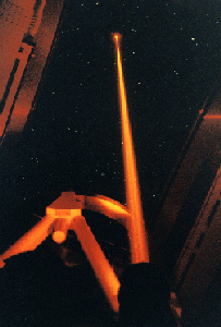 looking
along the laser beam from the telescope